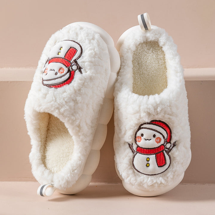 Weisse Plüsch-Hausschuhe mit einem fröhlichen Schneemann